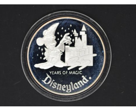 Silver - Disneyland 35YEARS OF MAGIC - A 1 troy oz (31.1 grams) fine grade .999 fine silver collectible coin / medallion stru