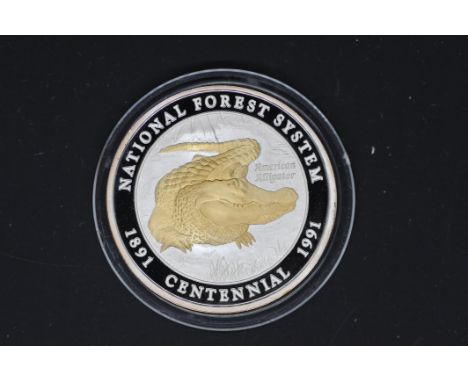 Silver - a 1 troy oz (31.1 grams) fine grade .999 fine silver collectible coin / medallion struck by Liberty mint in the USA.