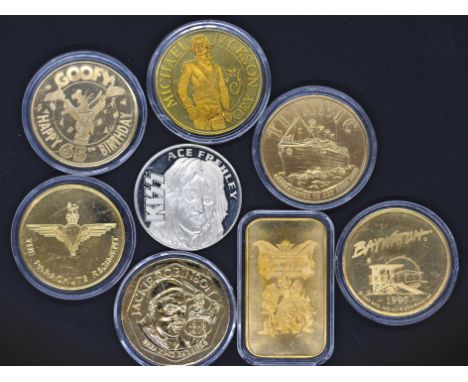 Collectable- Eight collectible coins / medallions struck by Liberty mint in the USA. These coins commemorate various events a