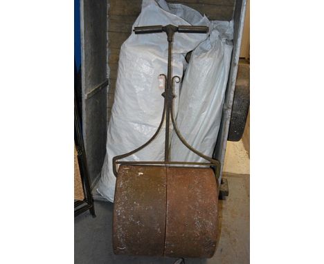 This Lot is at Gildings Market Harborough Sale Room.

Victorian cast iron garden roller, width of cylinder 54cm, turned woode