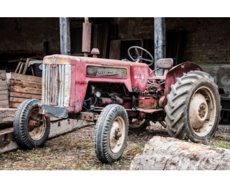 Vintage McCormick International B414 diesel tractor.