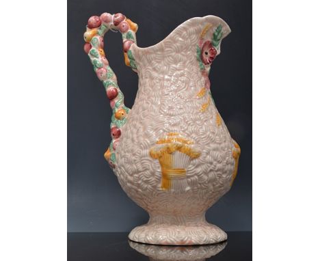 Clarice Cliff jug, Harvest pattern, pink ground, 29cm.