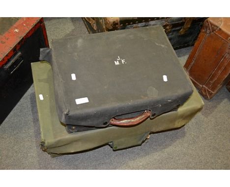 Small leather travelling trunk, initialled JMF, width 45cm with canvas outer cover and a larger leather suitcase, initialled 