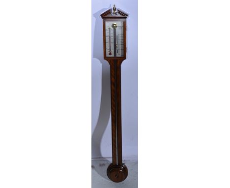 George III style mahogany stick barometer, with architectural pediment, herringbone stringing and boxwood inlay, turned ciste