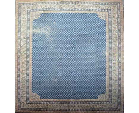 Persian pattern machine made carpet, blue ground with multiple borders, stencilled for Maple, approximately 370cm x 275cm.