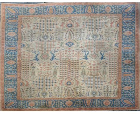 Persian pattern machine made carpet, fawn ground with stylised patterns, broad border, stencilled for Maple & Co., approximat