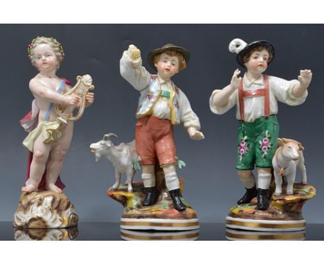 Meissen figure of a cherub musician, wearing a wreath and cloak, restored 18cm and two Continental figurines of an Alpine goa