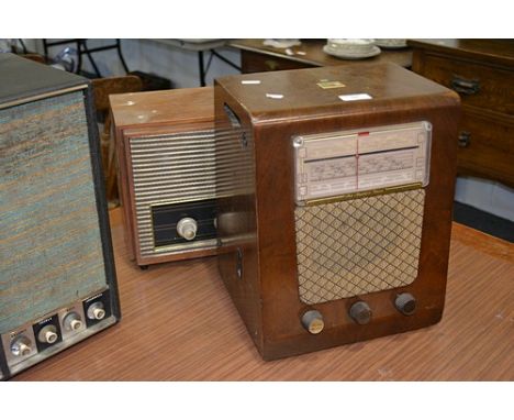 HMV walnut cased radio record player, width 28cm and a Stella walnut cased radio (2).