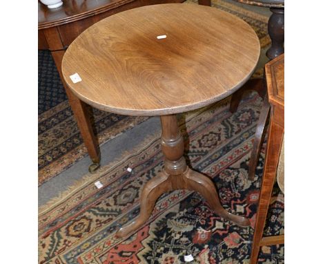 Mahogany pedestal table, circular tilt top, baluster column, tripod legs, diameter 53cms.