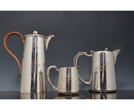 Electroplated five piece tea and coffee set, engraved The Royal Cafe, Brighton and a plated hot water jug (6).