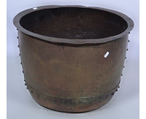 Chinese stained wood bucket, with a metal ring handle, 67cm.