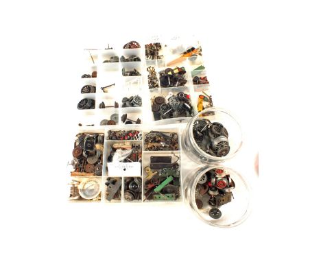 Boxed 0 gauge containing all types of spare engine parts
