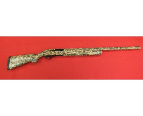A Hatsan Escort self loading shotgun 3" Magnum multichoke s/no. 072317 in original box with choke key and four spare chokes. 