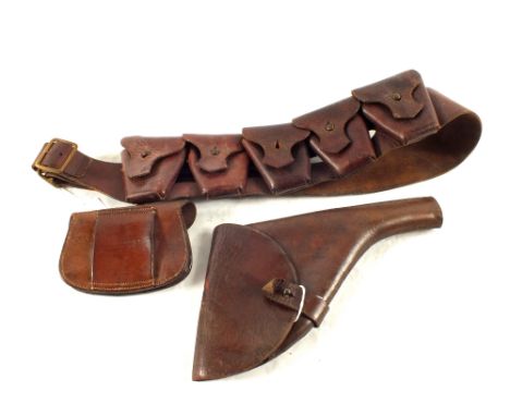 A WWI era holster by Wilkinson Pall Mall with a leather bandolier dated 1915 and an ammunition pouch dated 1917