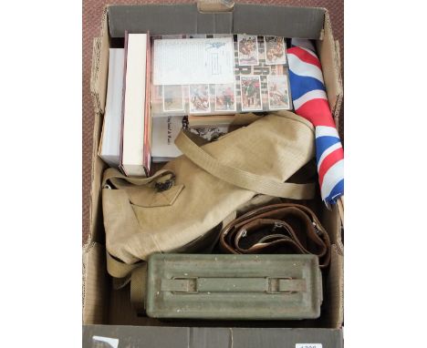 A mixed to include a M1 ammunition tin with books, haversack etc