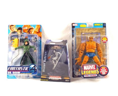 Blister boxed Hasbro Titanium Silver Surfer, Toy Biz The Thing, Dr Doom, Luke Cage (2) and The Watcher