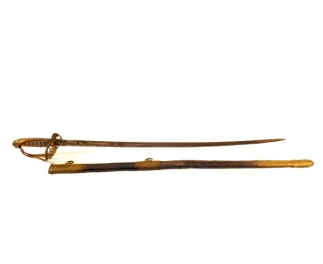 A Victorian Infantry Officers sword with its Brass and leather scabbard (as found)