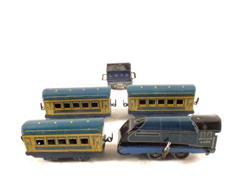 A Mettoy 0 gauge set (engine, tender and three coaches)
