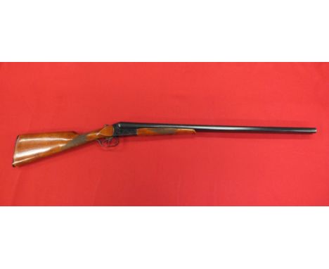 A Baikal 12 bore side by side shot gun with 28 1/2" barrels with excellent bores s/no. P18276. This item can only be purchase