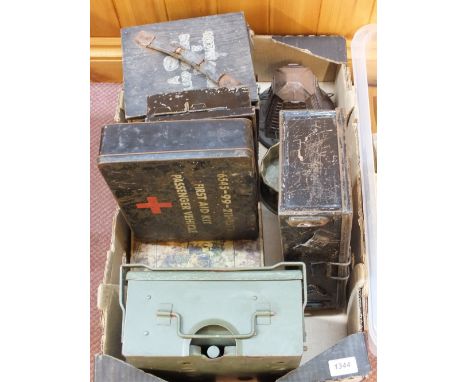 A mixed lot including a stove, Trench Art shell base and first aid tins