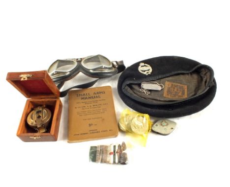 A mixed lot including goggles, boxed brass compass and a silver topped swagger stick