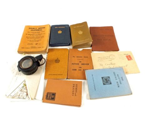WWII soldier's service and pay books, three Army Bibles, WWII Small Arms manual and 1940 dated compass