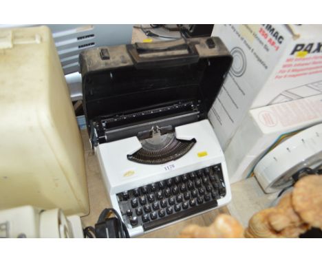 A typewriter in fitted case 