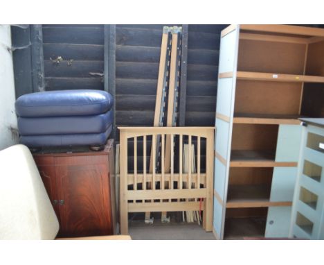 A light oak single bed frame