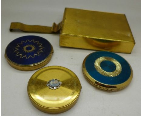 Three compacts including Stratton and a combination compact and cigarette case with initials