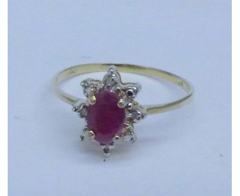 A 9ct gold, ruby and diamond ring, 1.1g, O