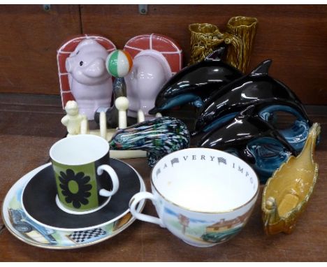 A novelty Wade seal corkscrew, Carlton Ware pig book-ends, Hornsea vase, Lurpak toast rack, Poole dolphins, a Worcester cup a