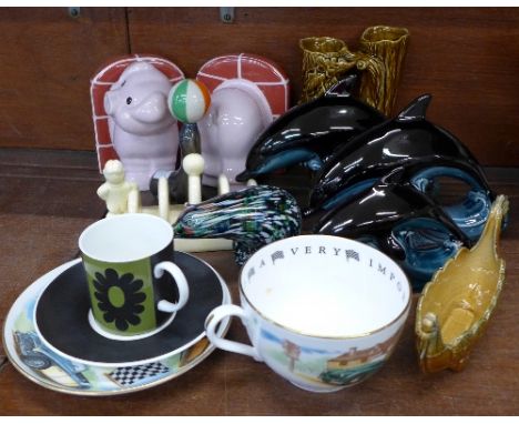 A novelty Wade seal corkscrew, Carlton Ware pig book-ends, Hornsea vase, Lurpak toast rack, Poole dolphins, a Worcester cup a