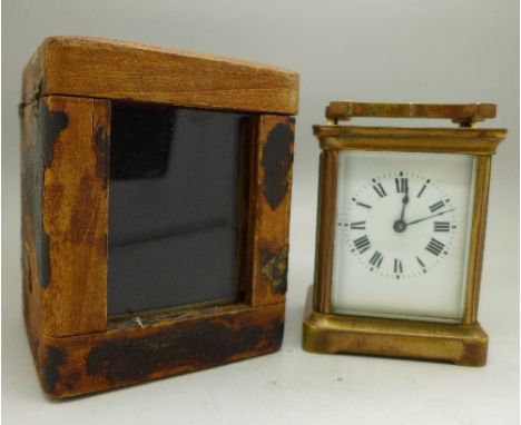 A brass carriage clock with case, 10cm