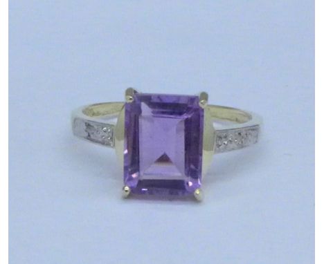 A 9ct gold, amethyst and diamond ring, 1.6g, O