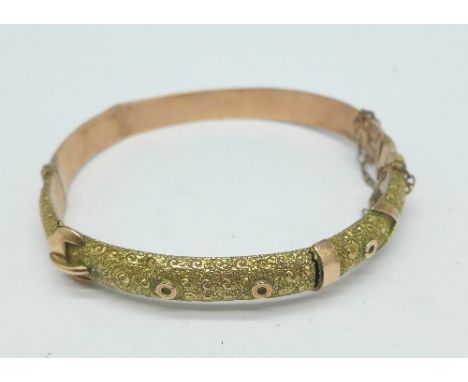 A 9ct gold bangle, 7.1g, with box, a/f