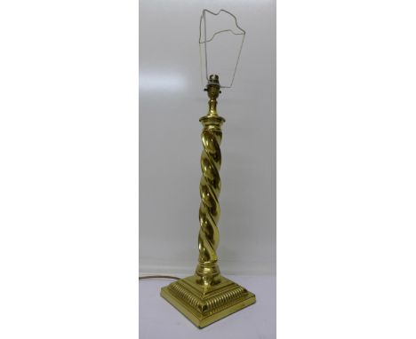 A brass barleytwist table lamp base, 55cm