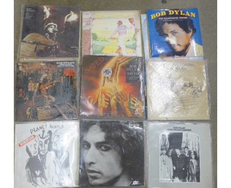 Twenty-one LP records, mainly Bob Dylan and Elton John