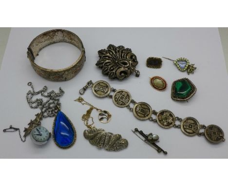 Two 19th Century mourning brooches, a moonstone set insect brooch, a 9ct gold pendant, a silver bangle, a/f, a stone set pin,