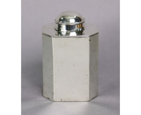 A George III silver tea caddy of rectangular straight-sided form with canted corners, domed pull-off cover, later engraved in