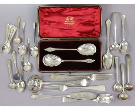 A pair of late Victorian silver preserve spoons with engraved fluted oval bowls, London 1900 by Jackson &amp; Fullerton, in f