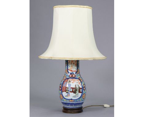 A 20th century Japanese porcelain baluster vase table lamp with figure scene &amp; floral decoration, on hardwood stand, 28” 