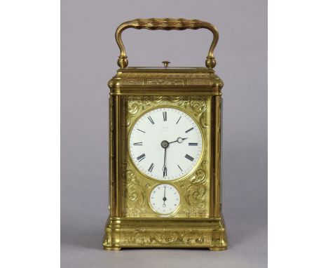 A VICTORIAN ENGRAVED GILT-BRASS EIGHT-DAY STRIKING &amp; REPEATING CARRIAGE CLOCK, by Dent. No. 4137, the 1?” white enamel di