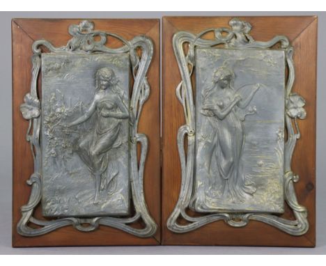 A pair of Arts &amp; Crafts embossed pewter rectangular panels, depicting ta maiden picking grapes, the other playing a harp,