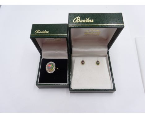 Black cabachon opal and diamond gold cluster ring, stamped 18ct and matching pair of stud earrings both purchased from Boodle