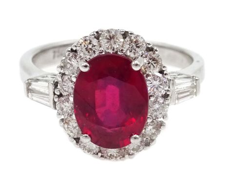 18ct white gold ruby and diamond cluster ring, with tapering baguette diamond shoulders, stamped 750, ruby approx 2.4 carat, 