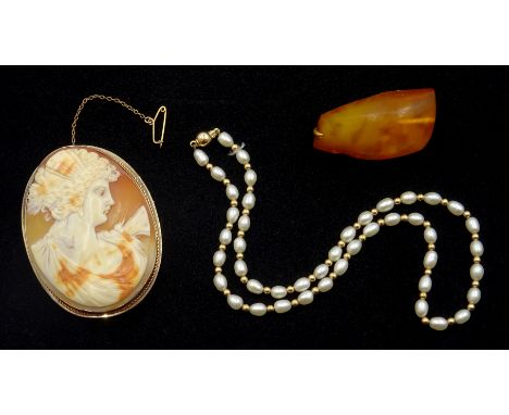 Gold mounted cameo brooch depicting portrait of a lady, stamped 9ct, Gold and pearl necklace, hallmarked 9ct and amber brooch