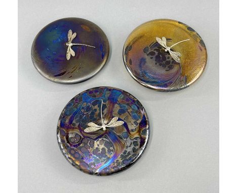 THREE KRIS HEATON ART GLASS PAPERWEIGHTS, of circular disk design with applied sterling silver dragonflies, all inscribed to 