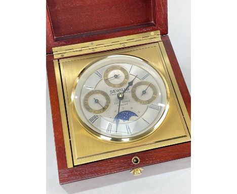 SEWILLS ELECTRIC TABLE CLOCK, modelled as a marine chronometer, with triple calender moonphase dial, Hermle 2100 quartz movem