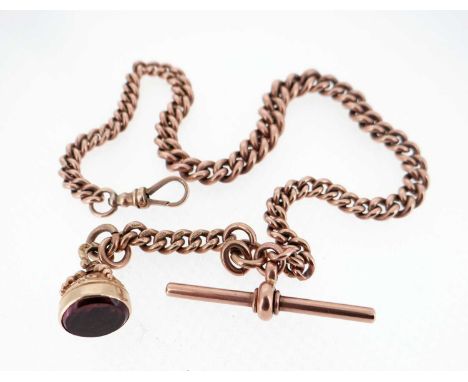 9CT GOLD ALBERT WATCH CHAIN, having graduated curb links, T-bar and gem set seal, believed amethyst, 32cms long, 32.8gmsProve