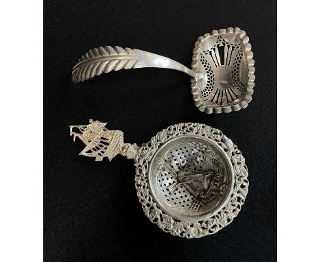 DUTCH SILVER comprising tea strainer by B. W. van Eldik, mid century with lion passant, ornately decorated and pierced, toget